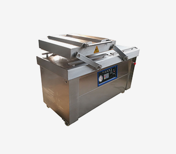 Double chamber vacuum packaging machine